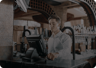 Bar staff operating a register